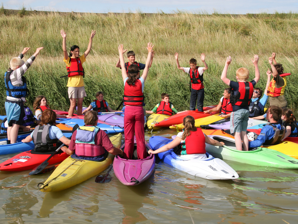 Young people taking part in a watersports session